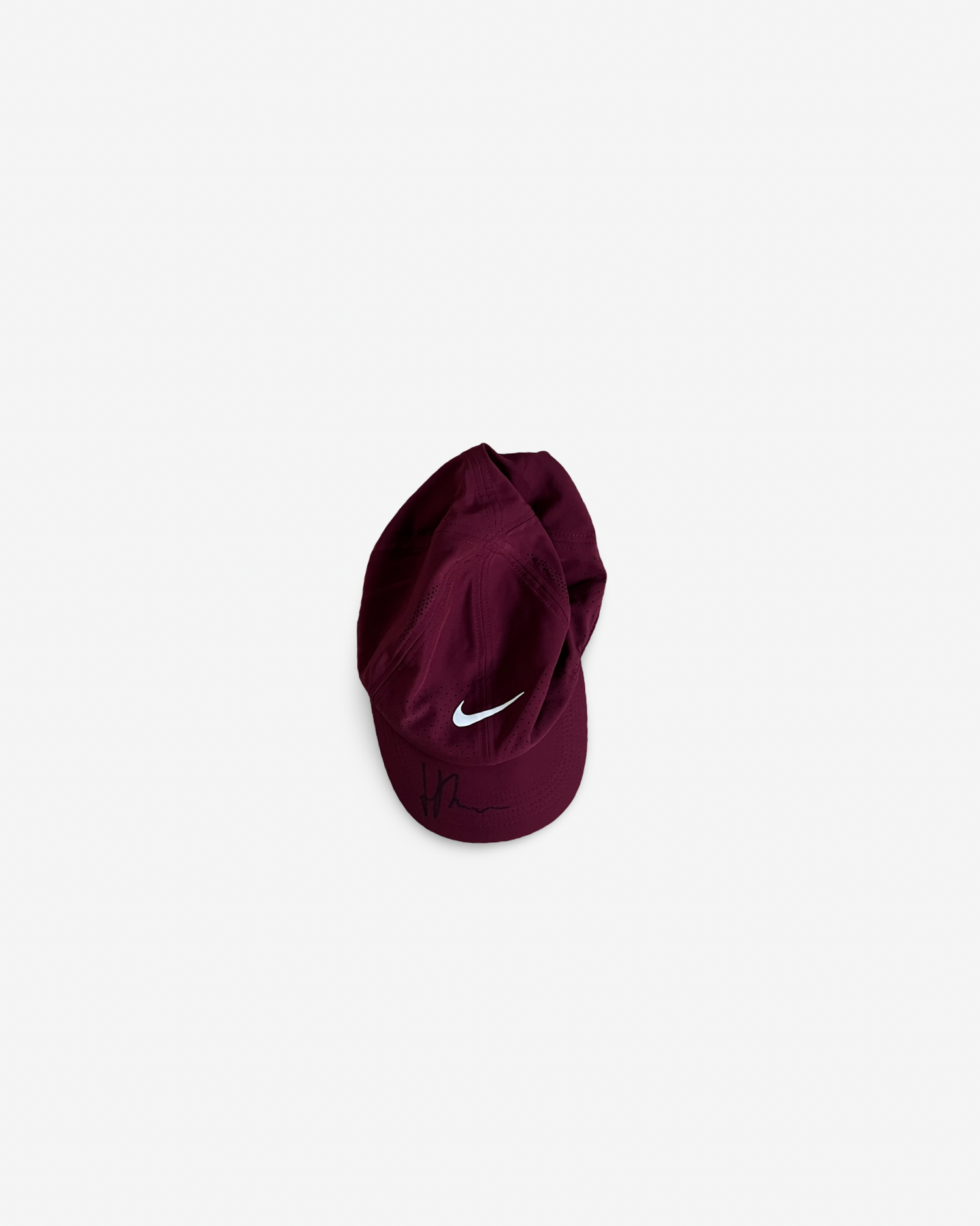 Burgundy match and practice cap, signed