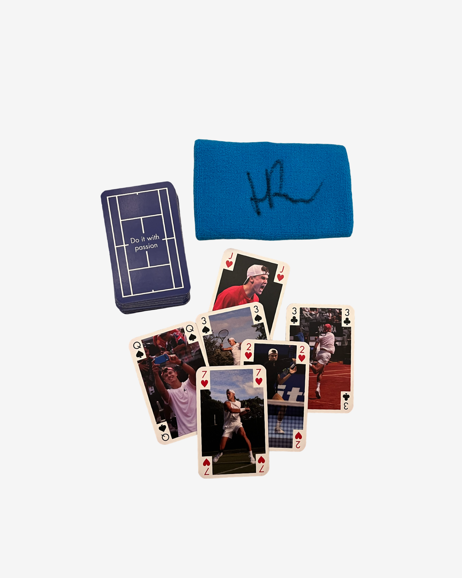 One signed used wristband and card game