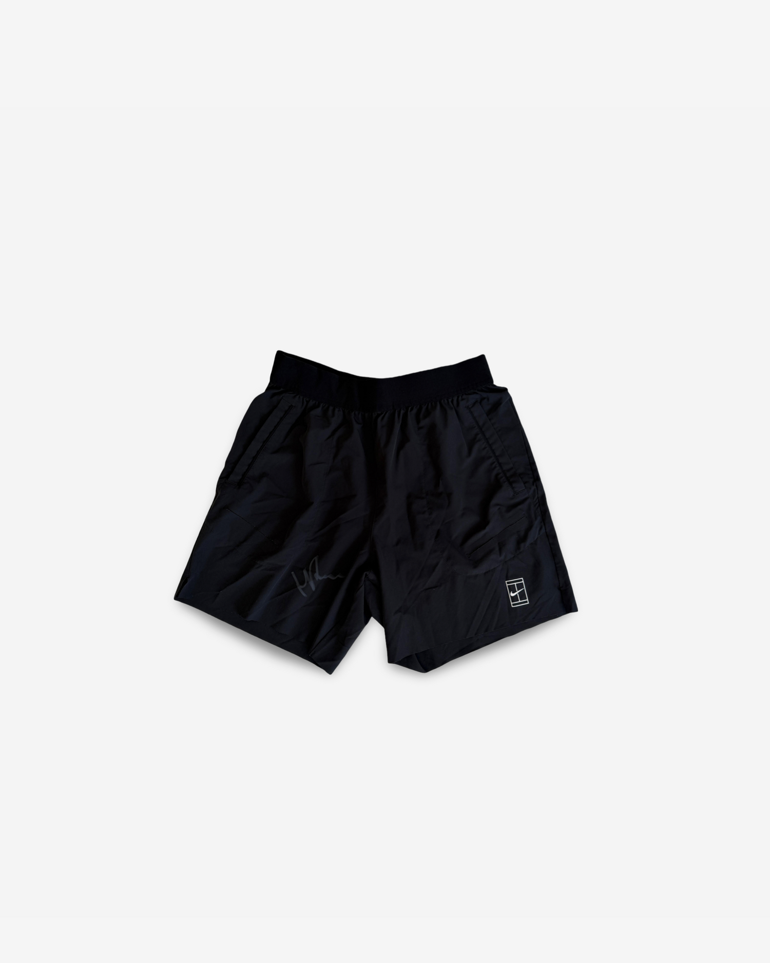 Signed black shorts used for matches and practice
