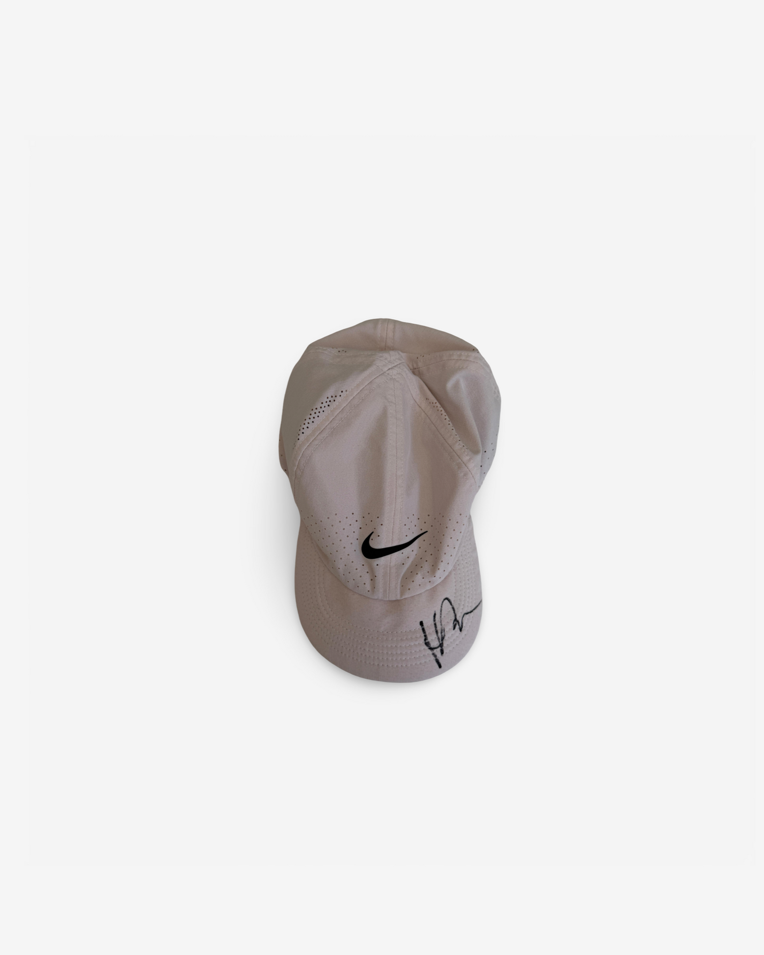White cap, signed and very used in clay season
