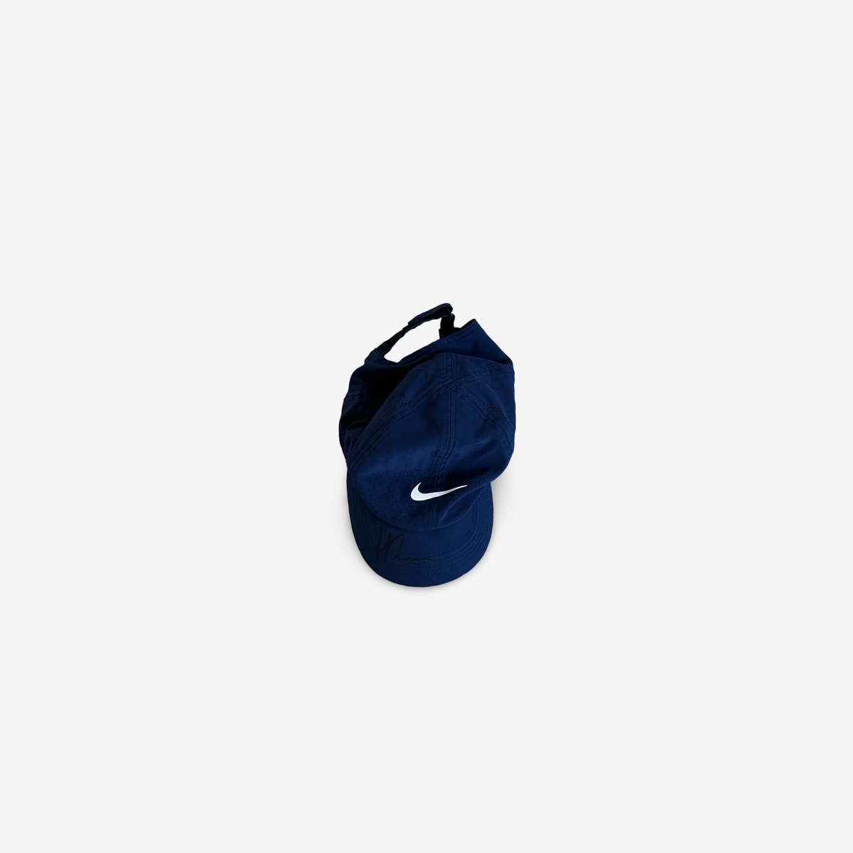 Dark blue match and practice cap, signed