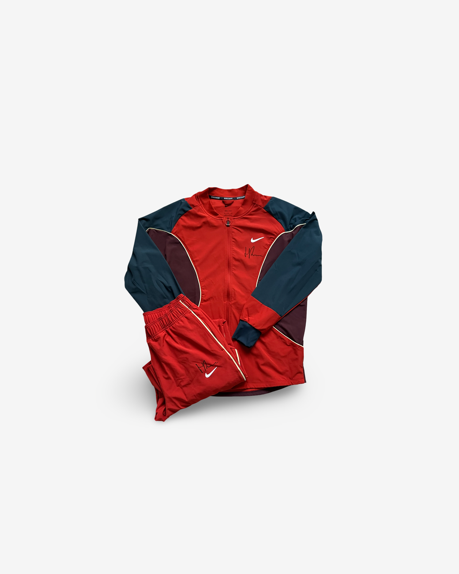 Red track suit , signed