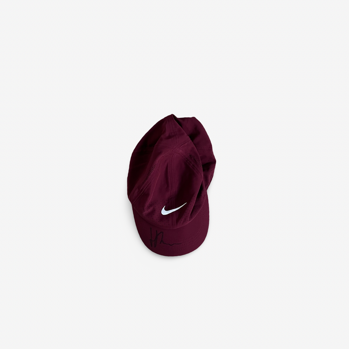 Burgundy match and practice cap, signed