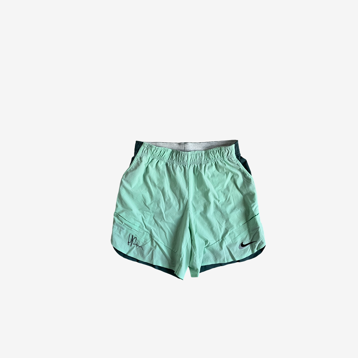 2 coloured match and practice shorts, signed