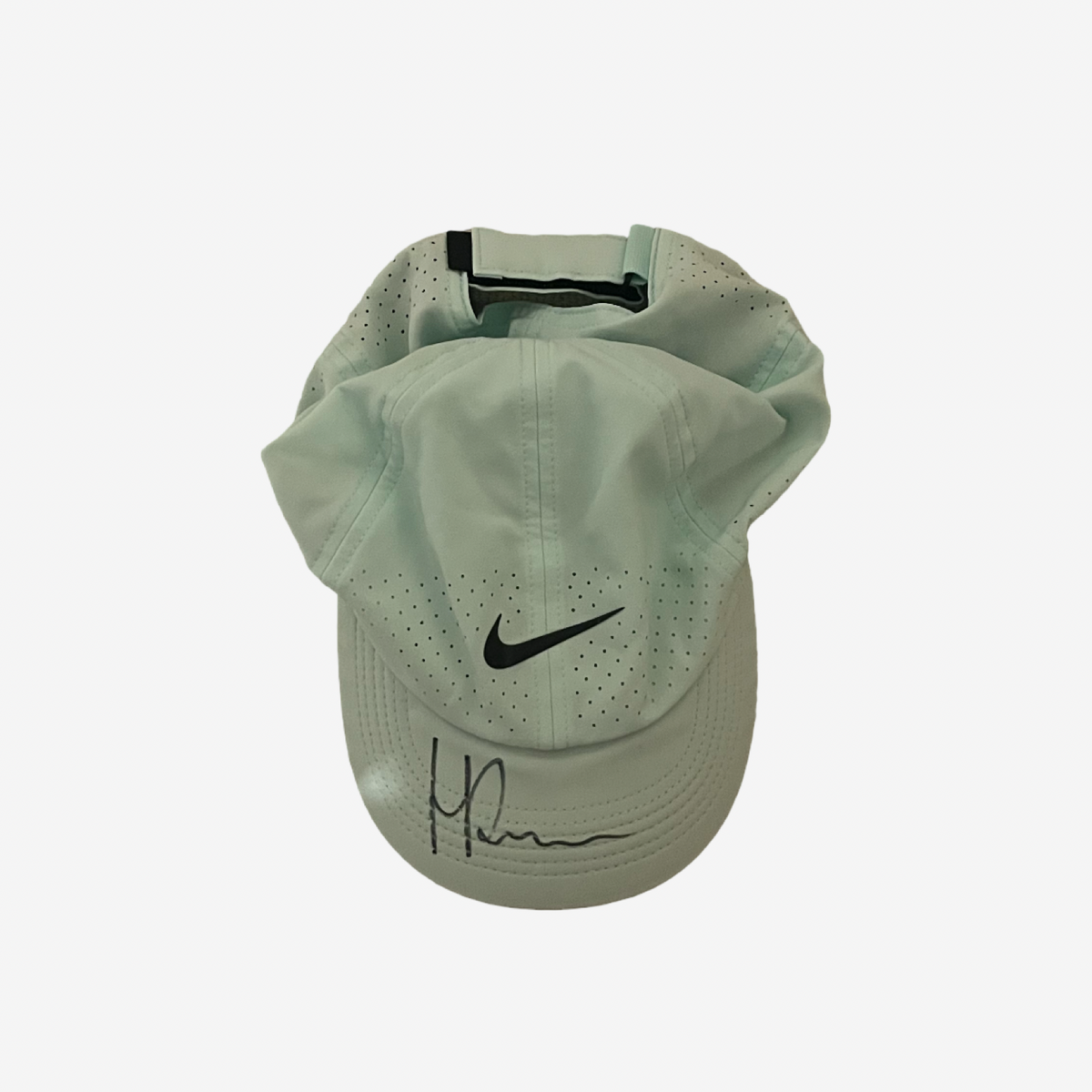 Signed match used mint green cap