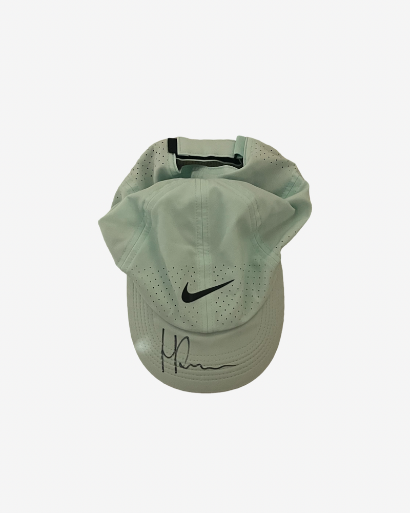 Signed match used mint green cap