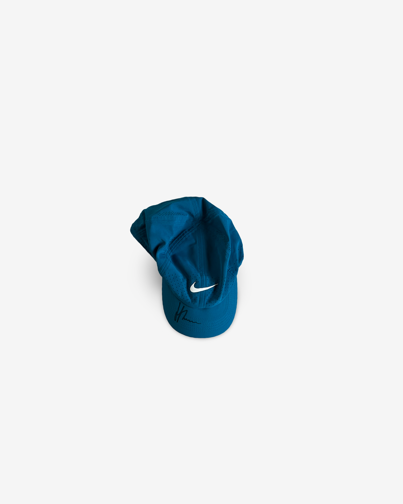 Blue match and practice cap, signed