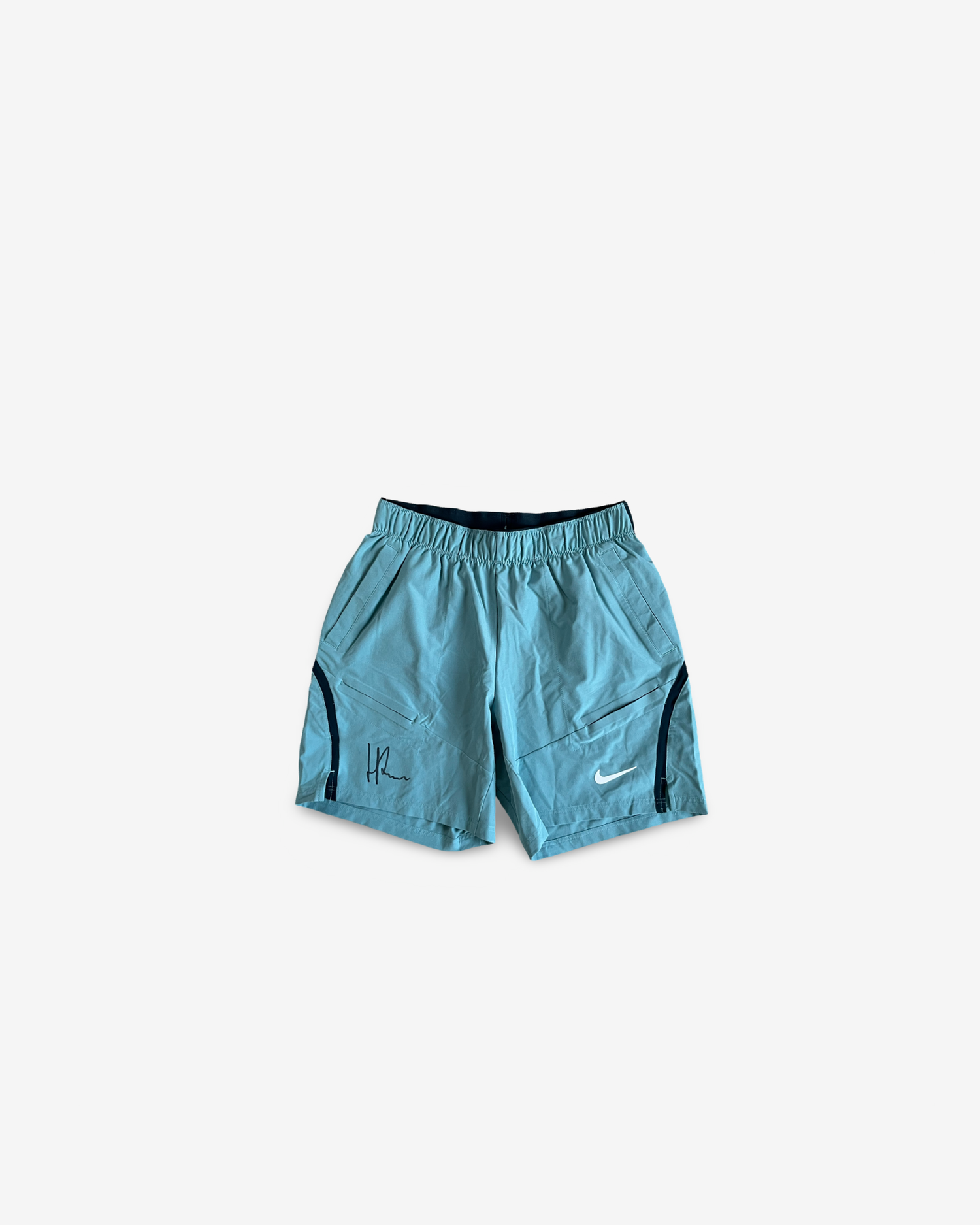 Blue practice and match shorts, signed