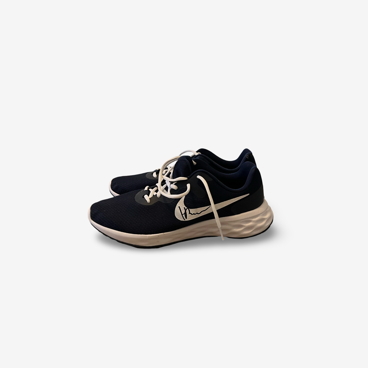Dark blue runners, signed