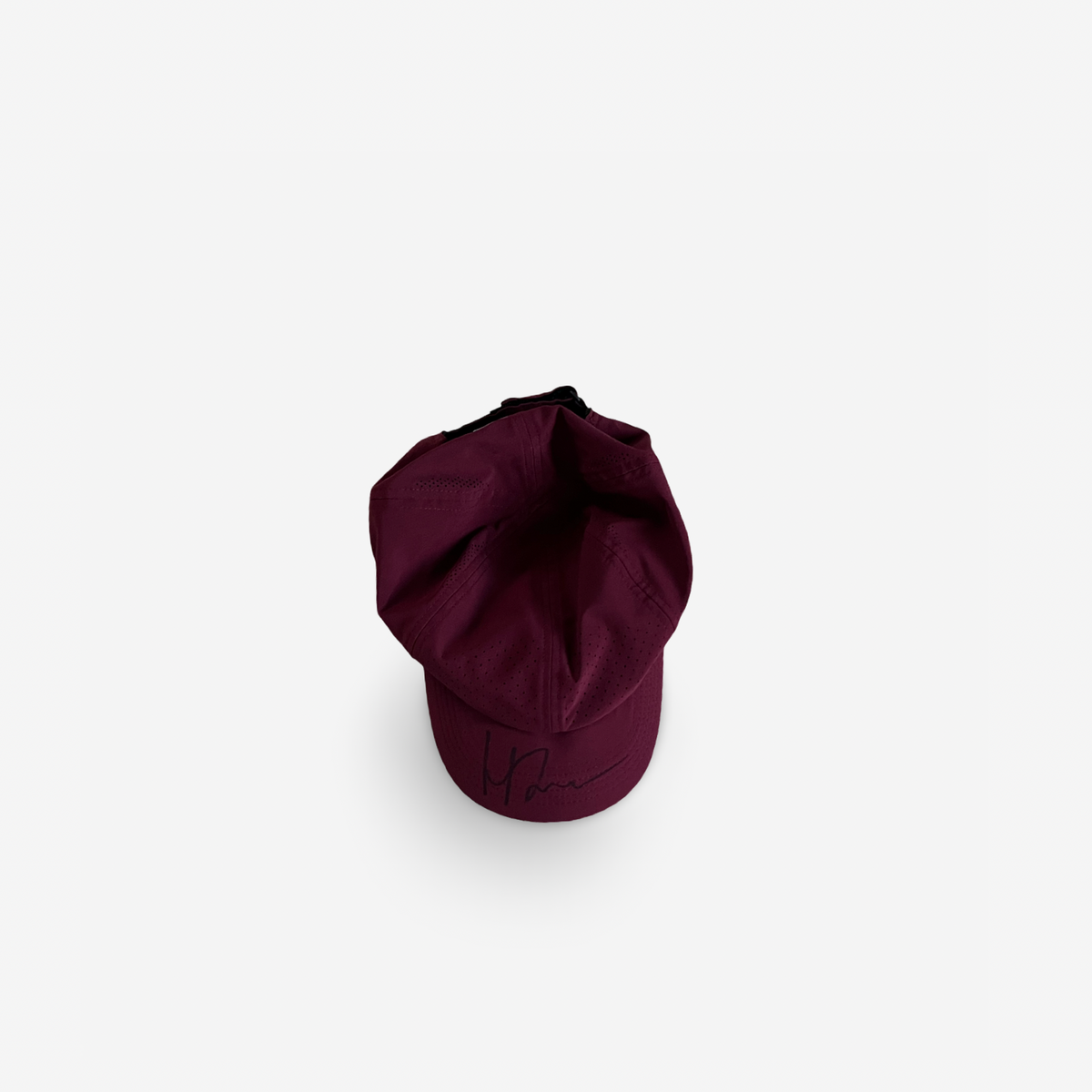 Burgundy match and practice cap, signed