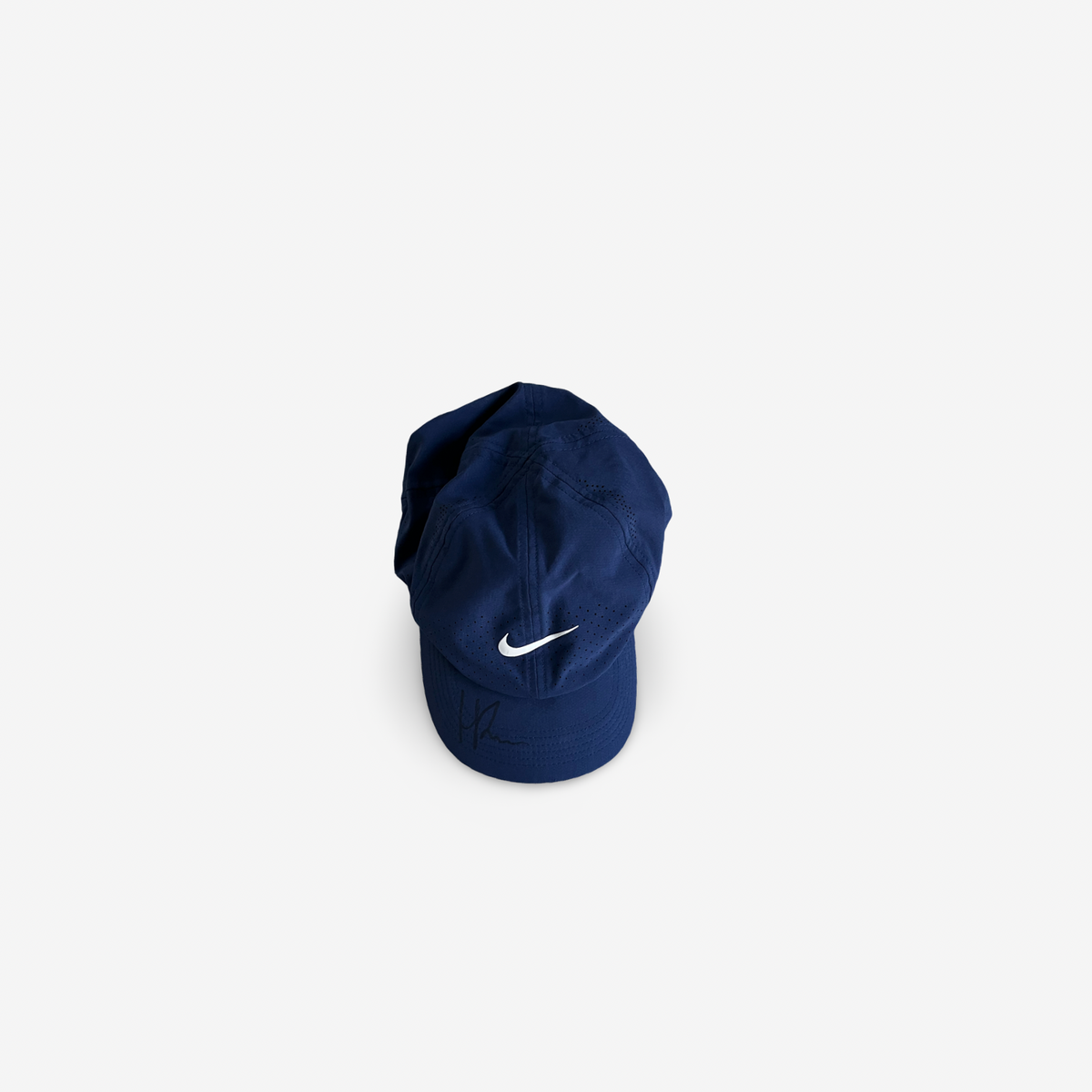 Dark blue match cap, signed