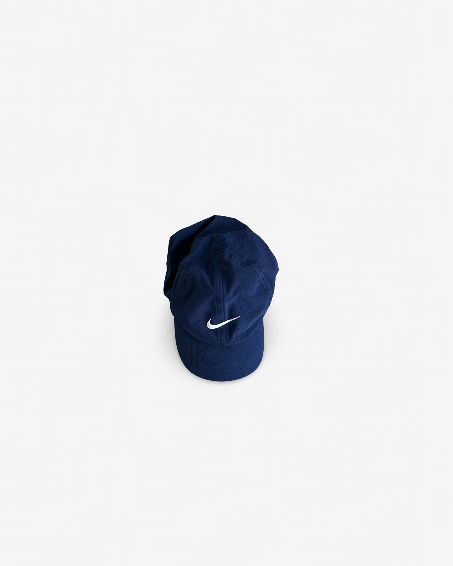 Dark blue match cap, signed