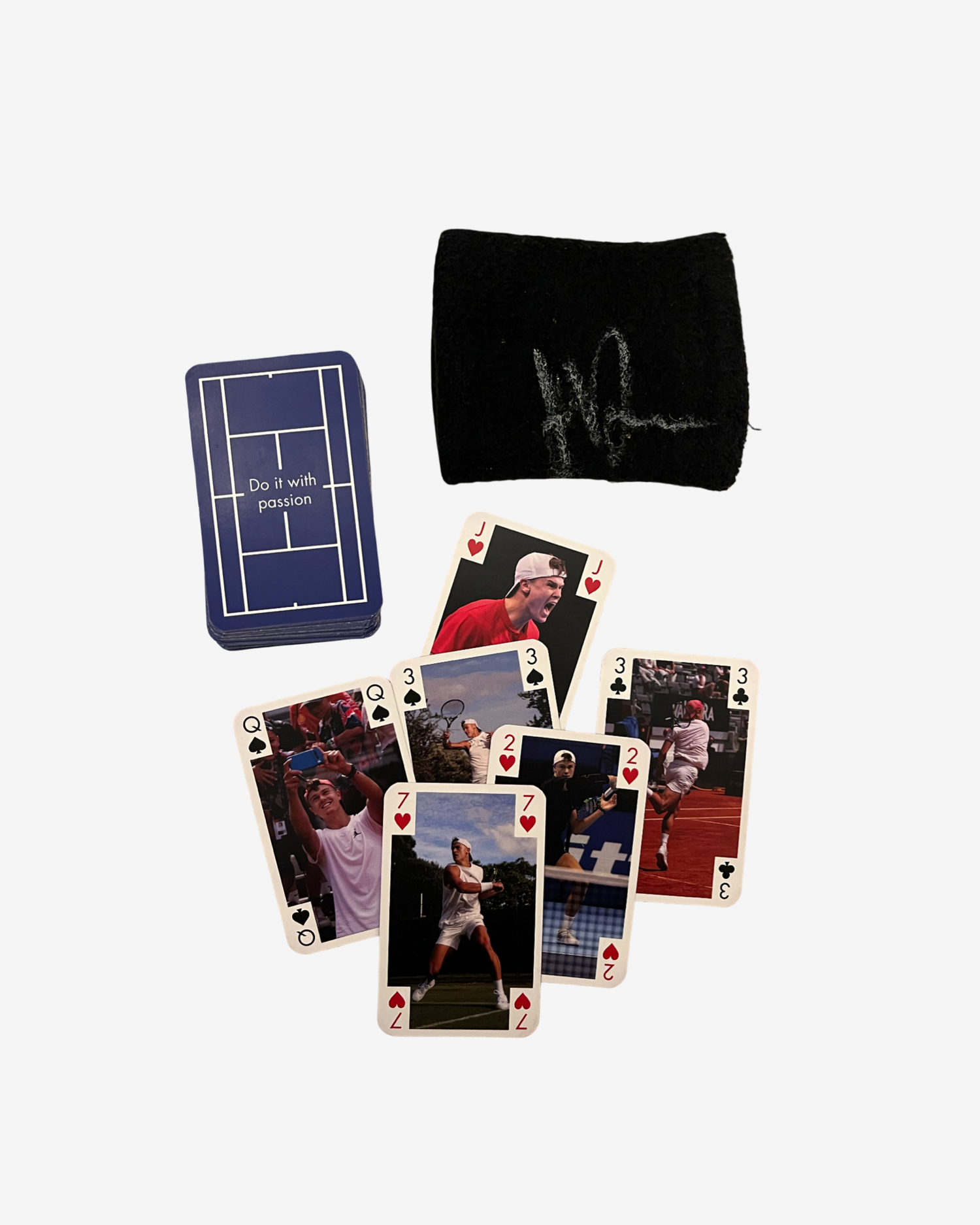 One black signed used wristband and card game