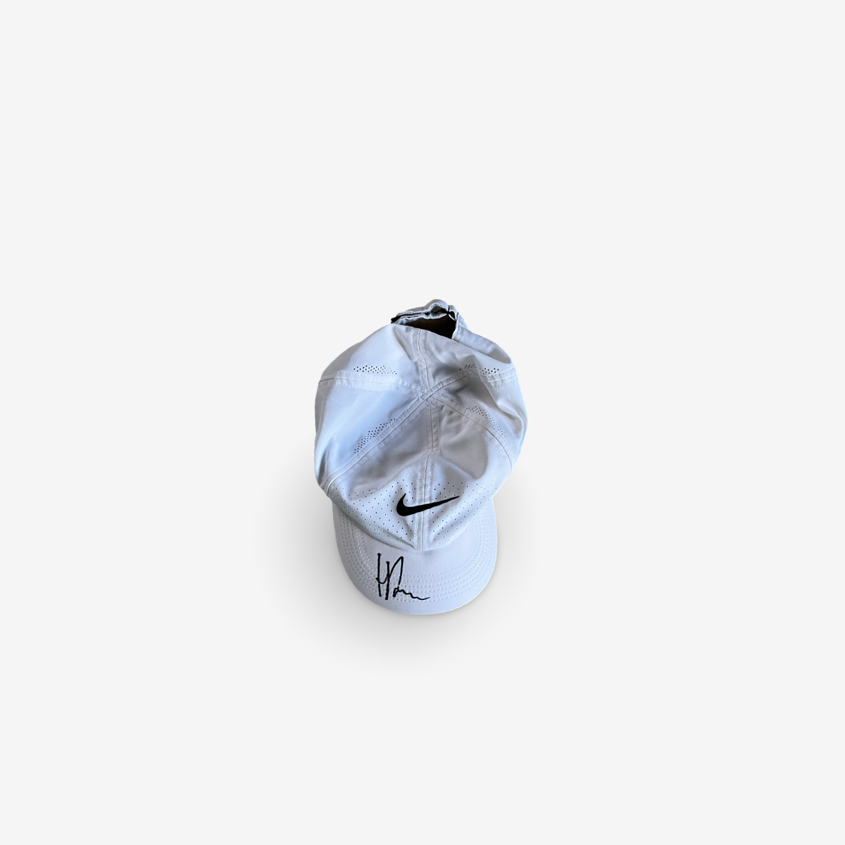 White match and practice cap, signed
