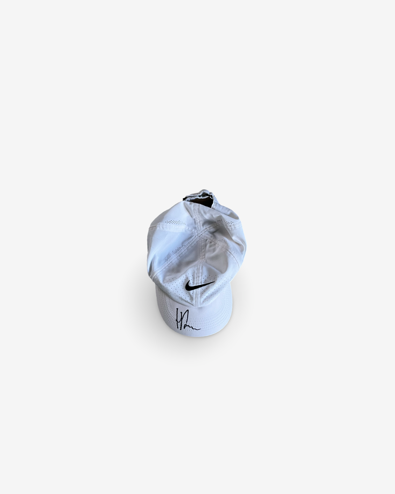White match and practice cap, signed