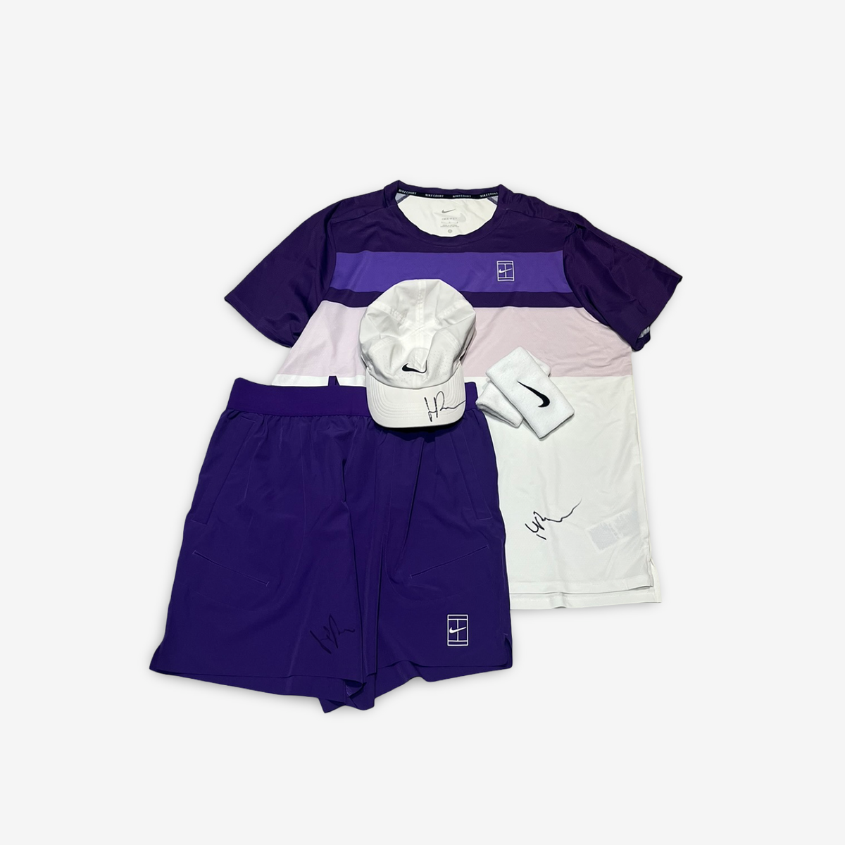 Signed and practice worn. Purple/white complete outfit