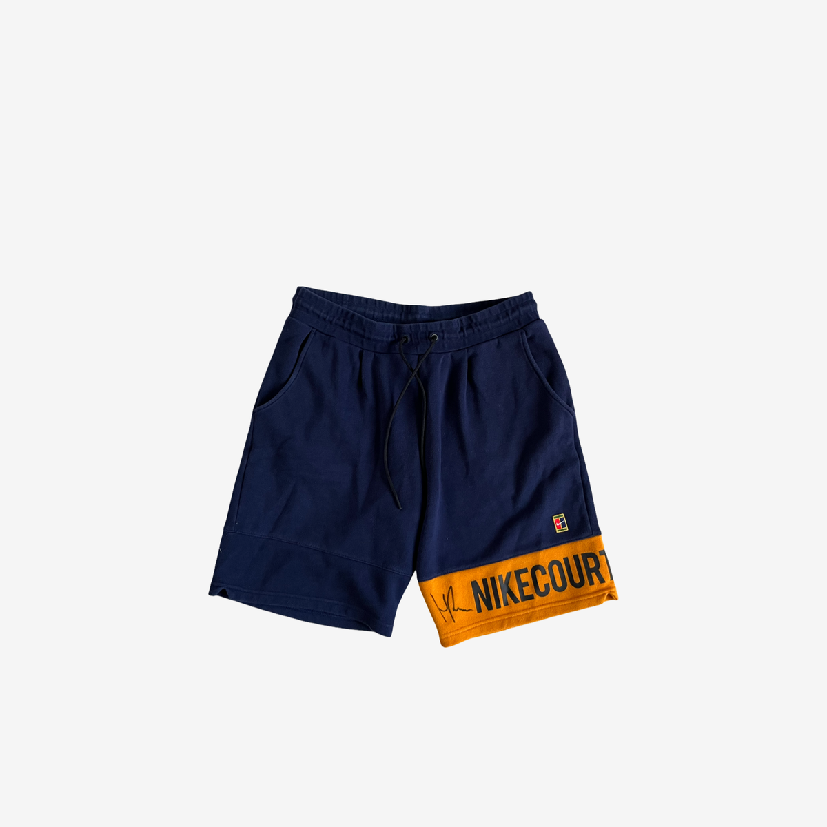 Dark blue and orange off court shorts, signed