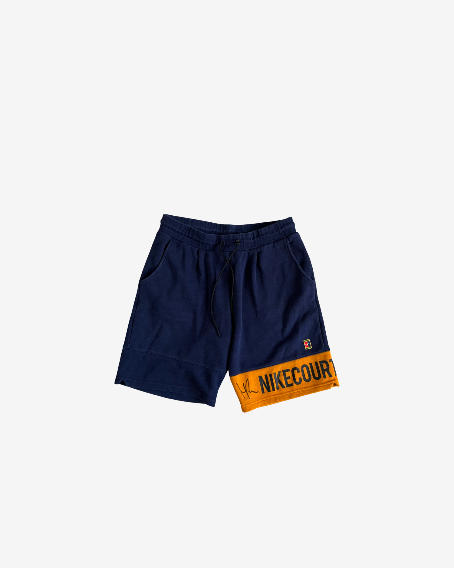 Dark blue and orange off court shorts, signed