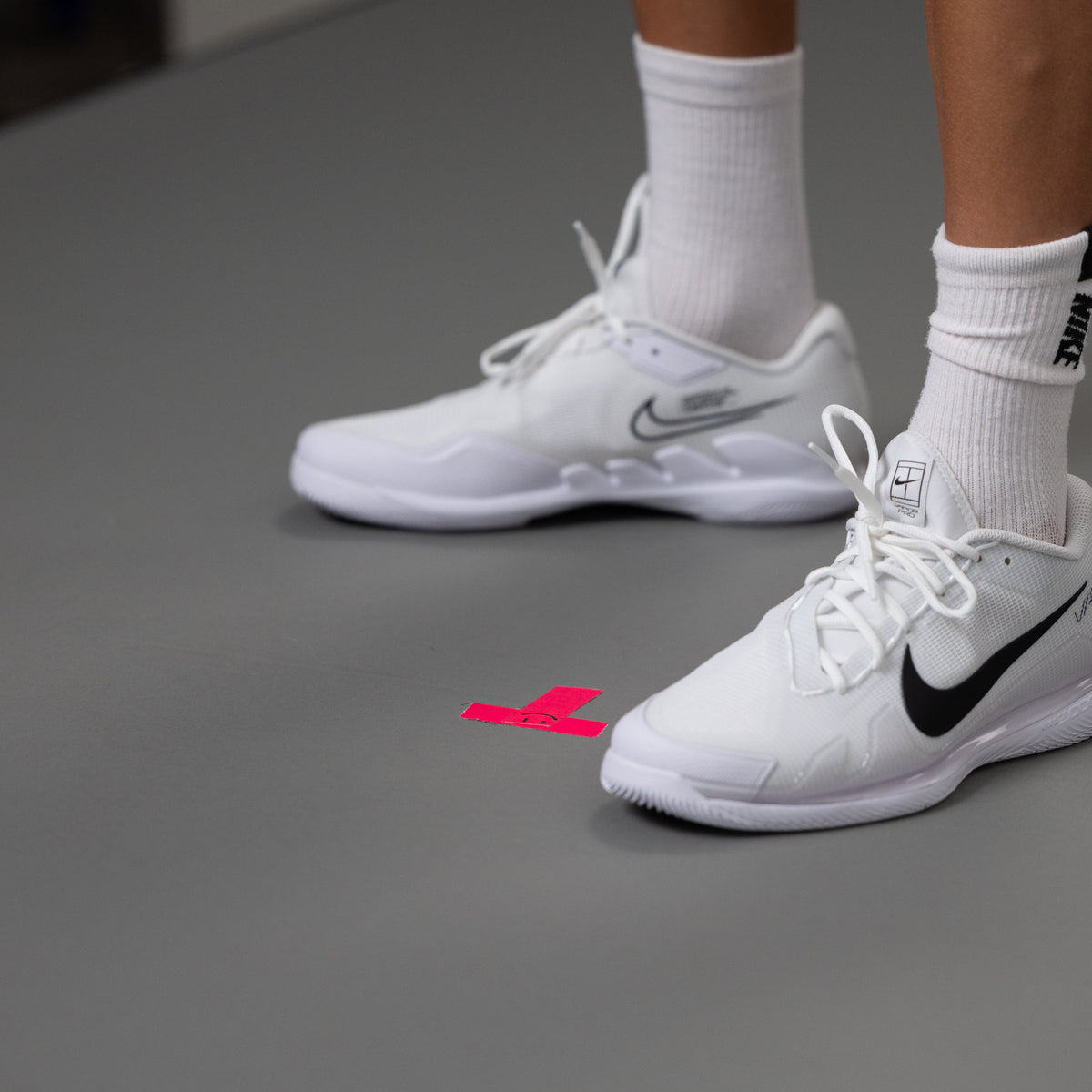 Signed and match used Vapor Pro tennis shoes