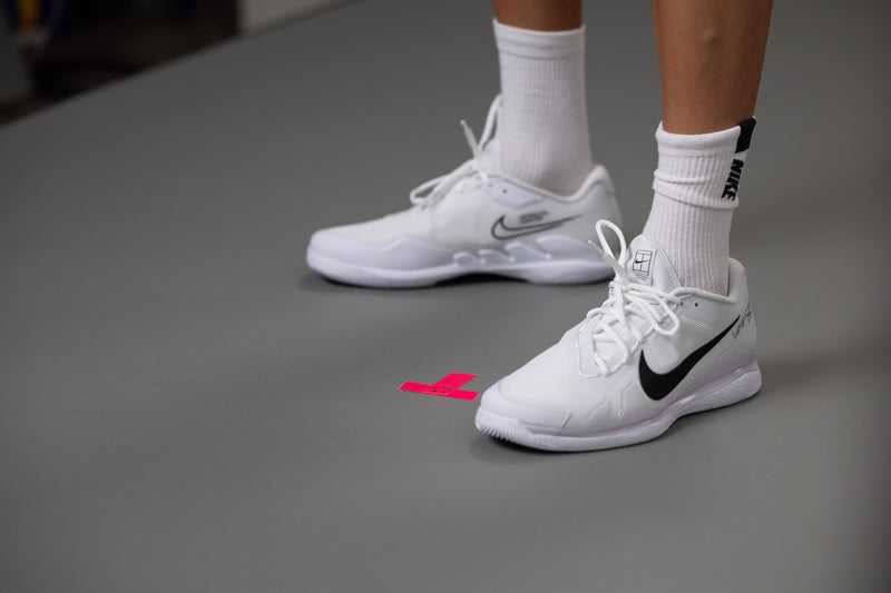 Signed and match used Vapor Pro tennis shoes