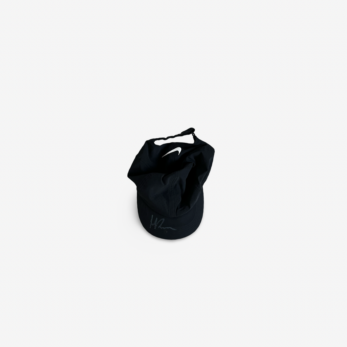 Black match and practice cap, signed