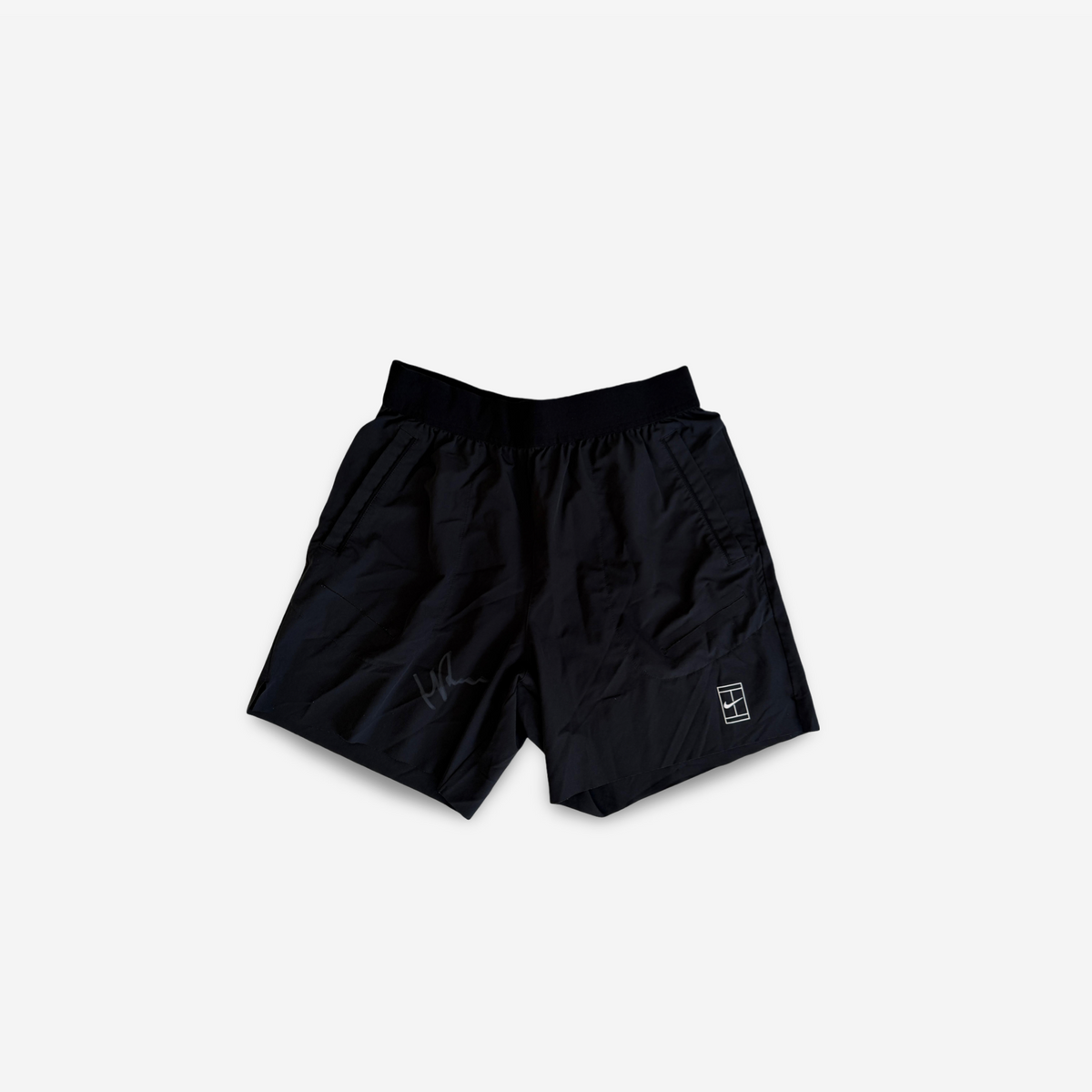 Signed black shorts used for matches and practice