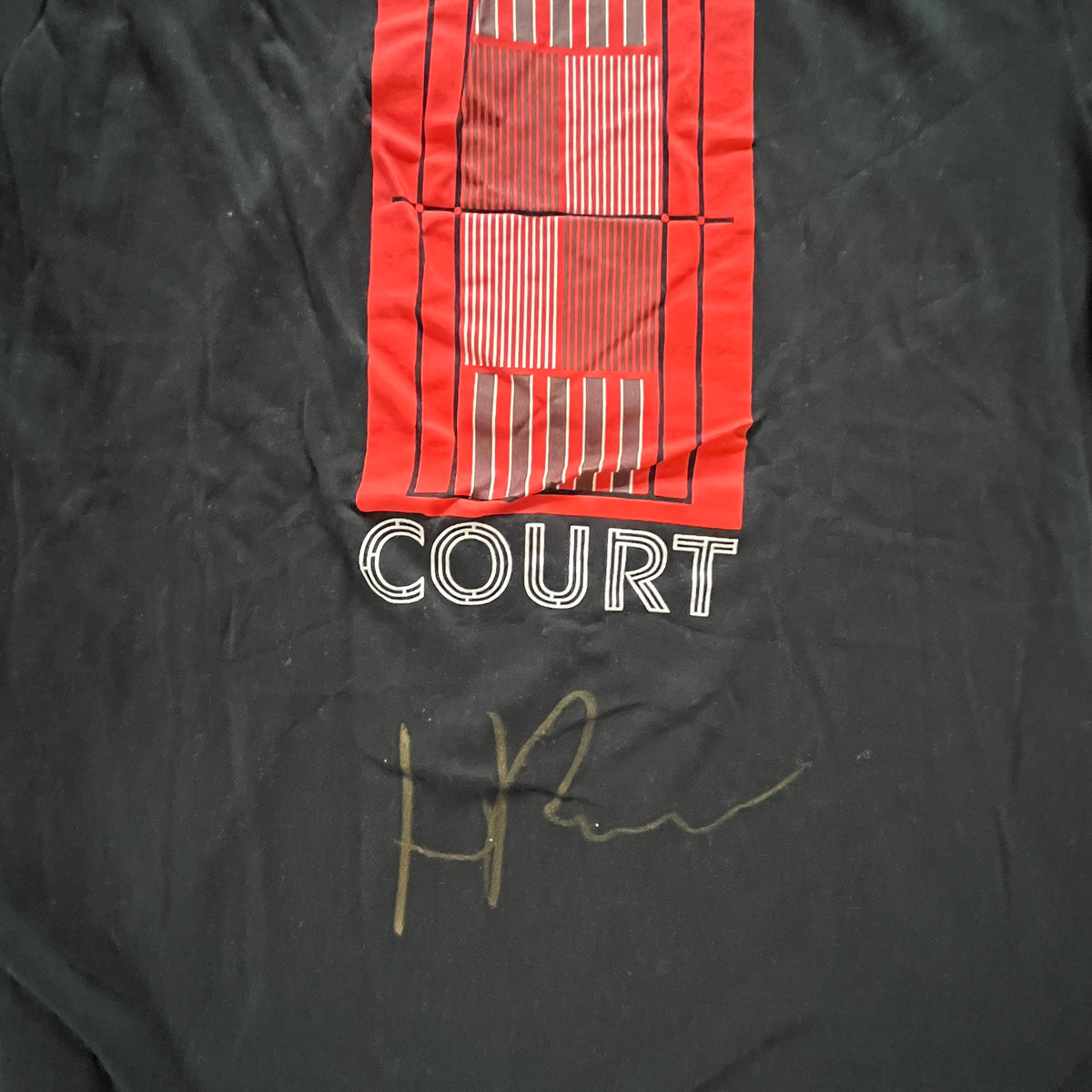 Signed on the back. Nike Practice Shirt #11