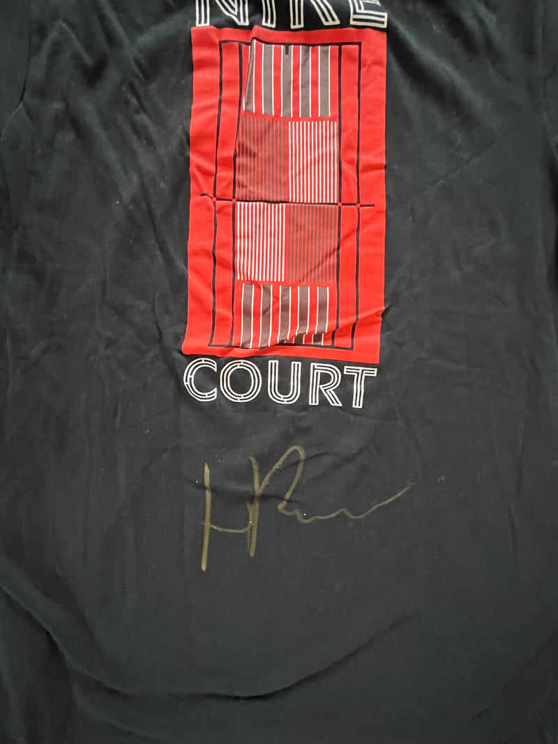 Signed on the back. Nike Practice Shirt #11