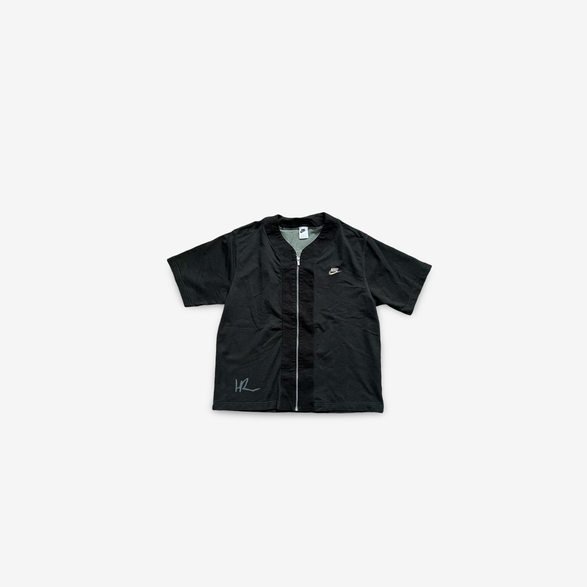 Black top with logo in the back , signed