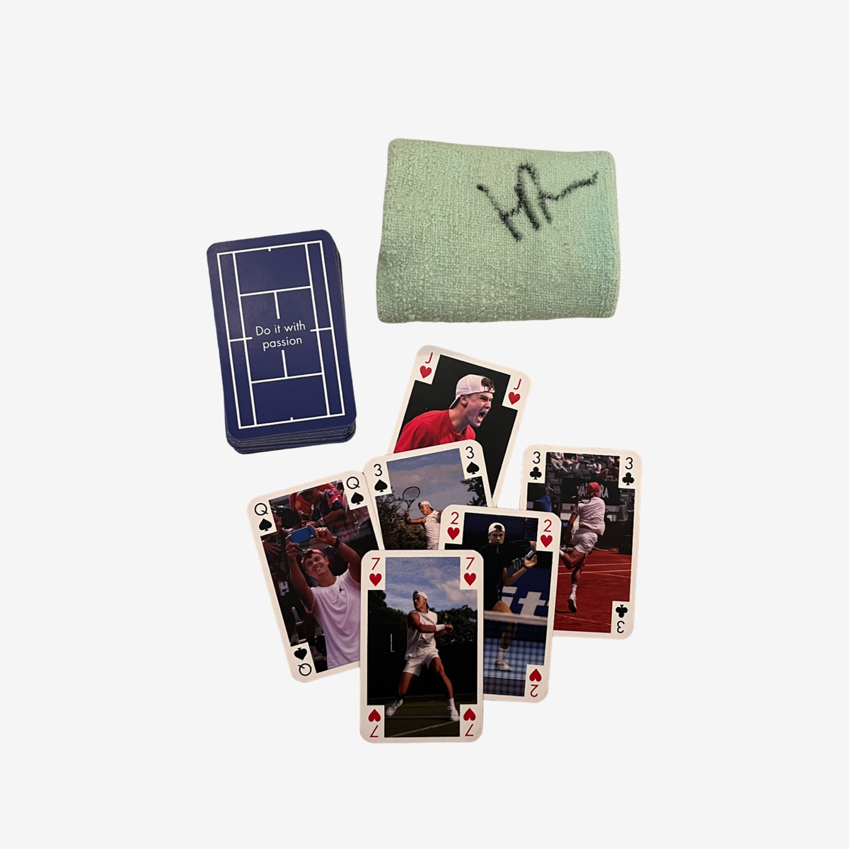One signed match used mint green wristband and card game
