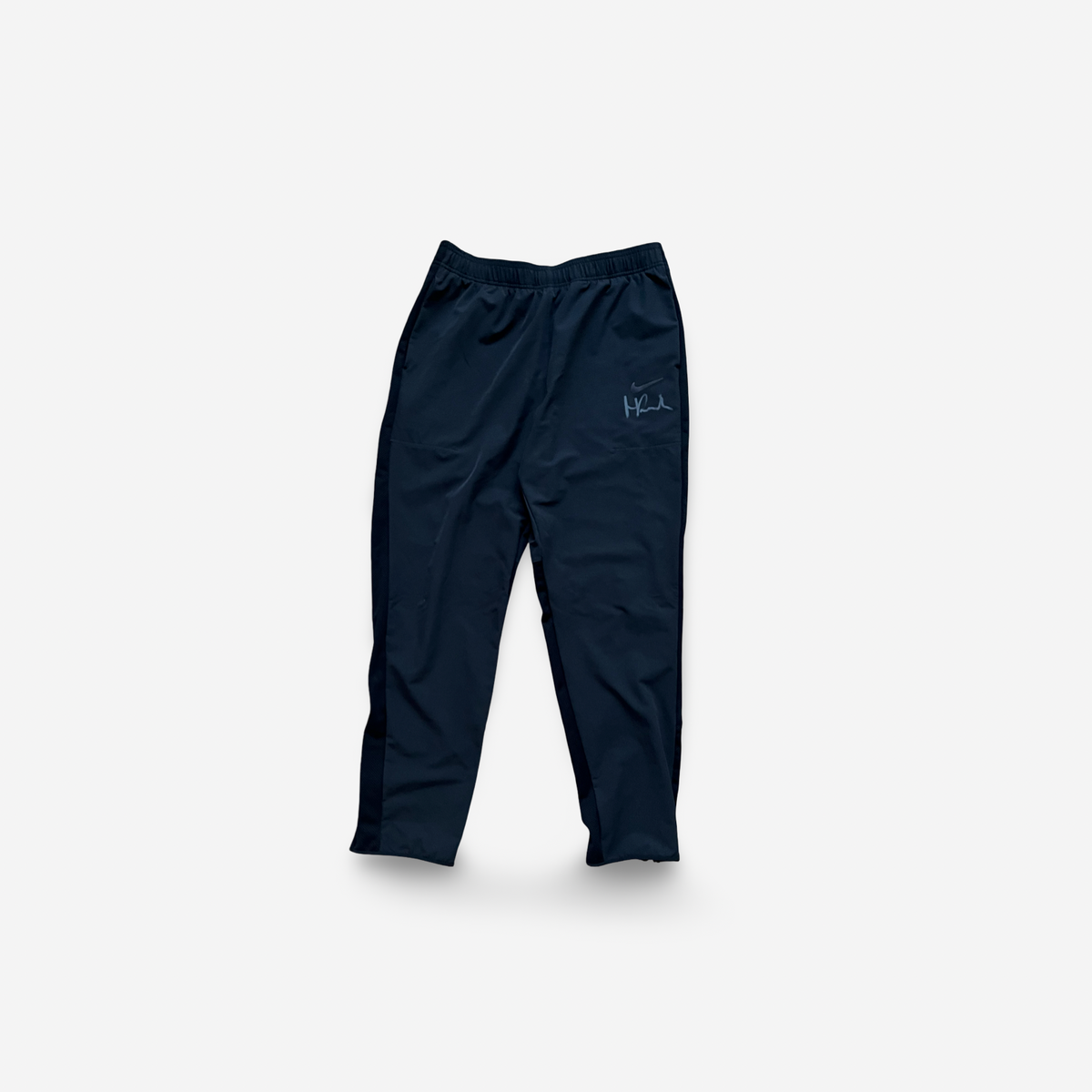 Black training pants, signed