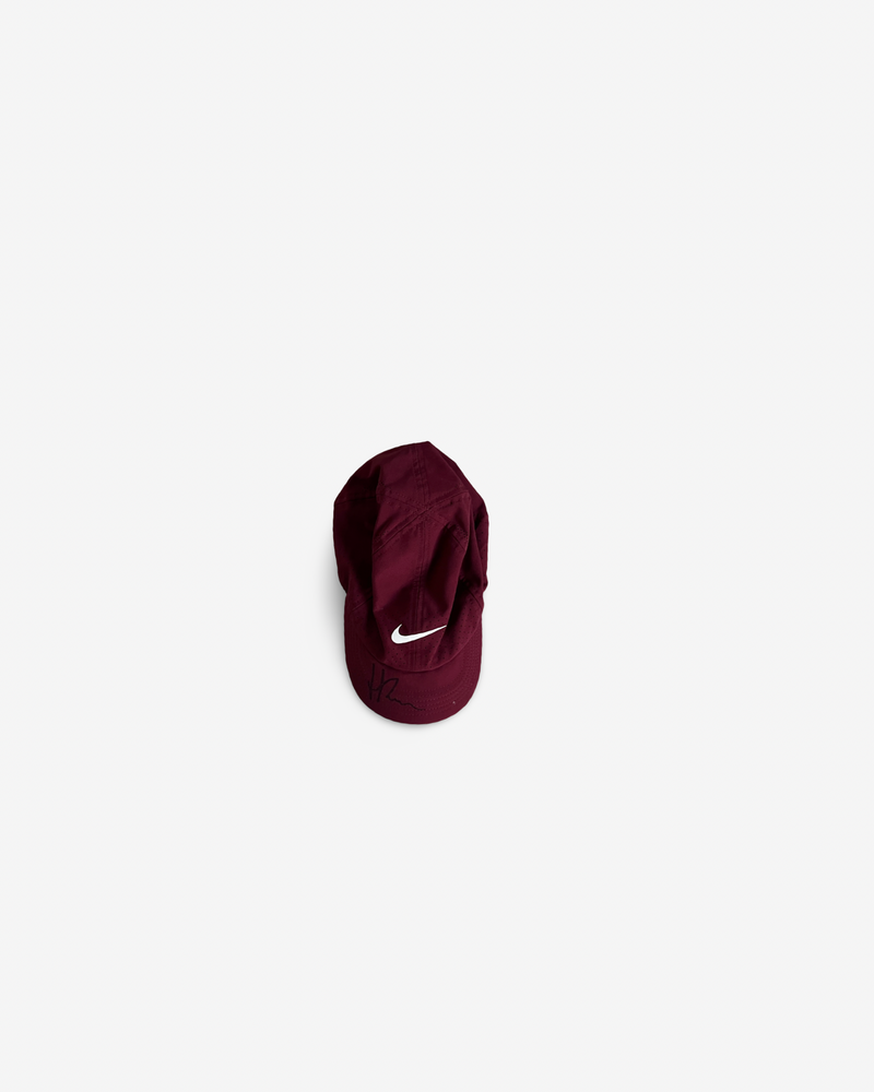 Burgundy match cap, signed