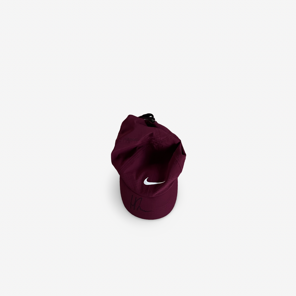 Burgundy match and practice cap, signed