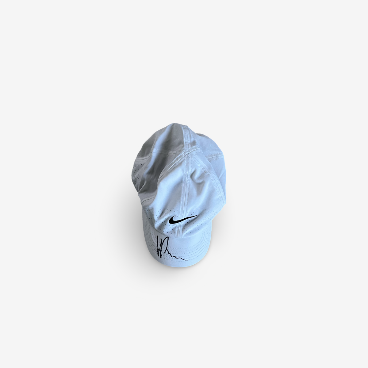 White match and practice cap, signed