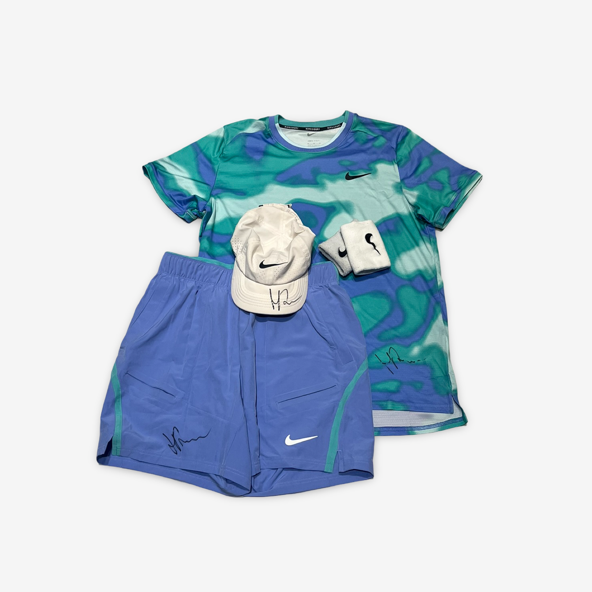 Signed and practice worn. Blue pattern complete outfit