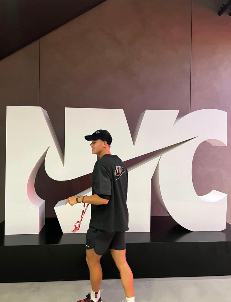 Black top with logo in the back , UsOpen collection, signed