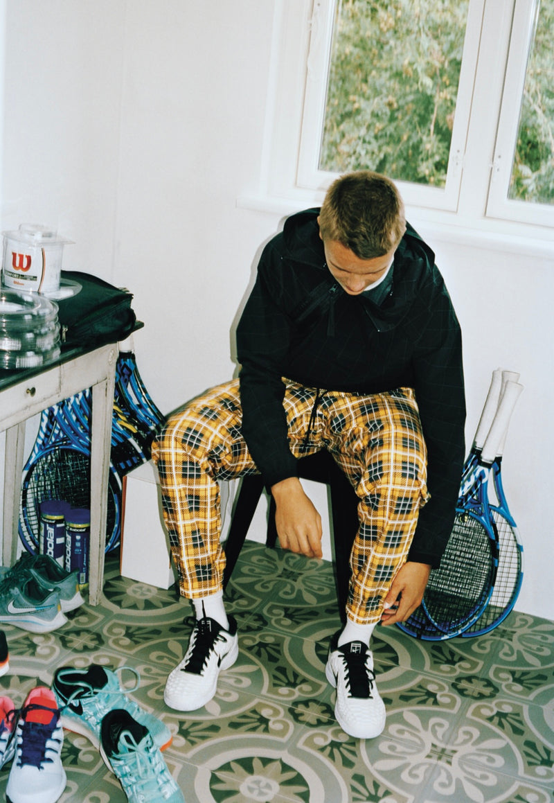 Off court in style.   Pants, used, signed