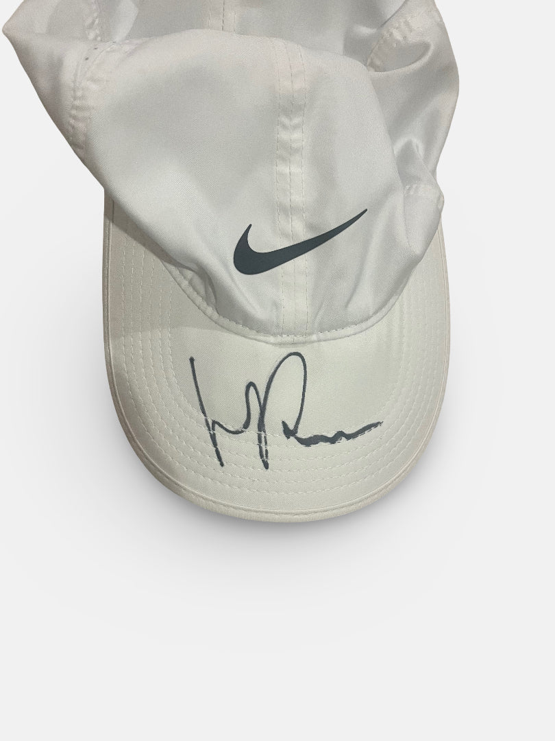 Signed Cap, long shadow